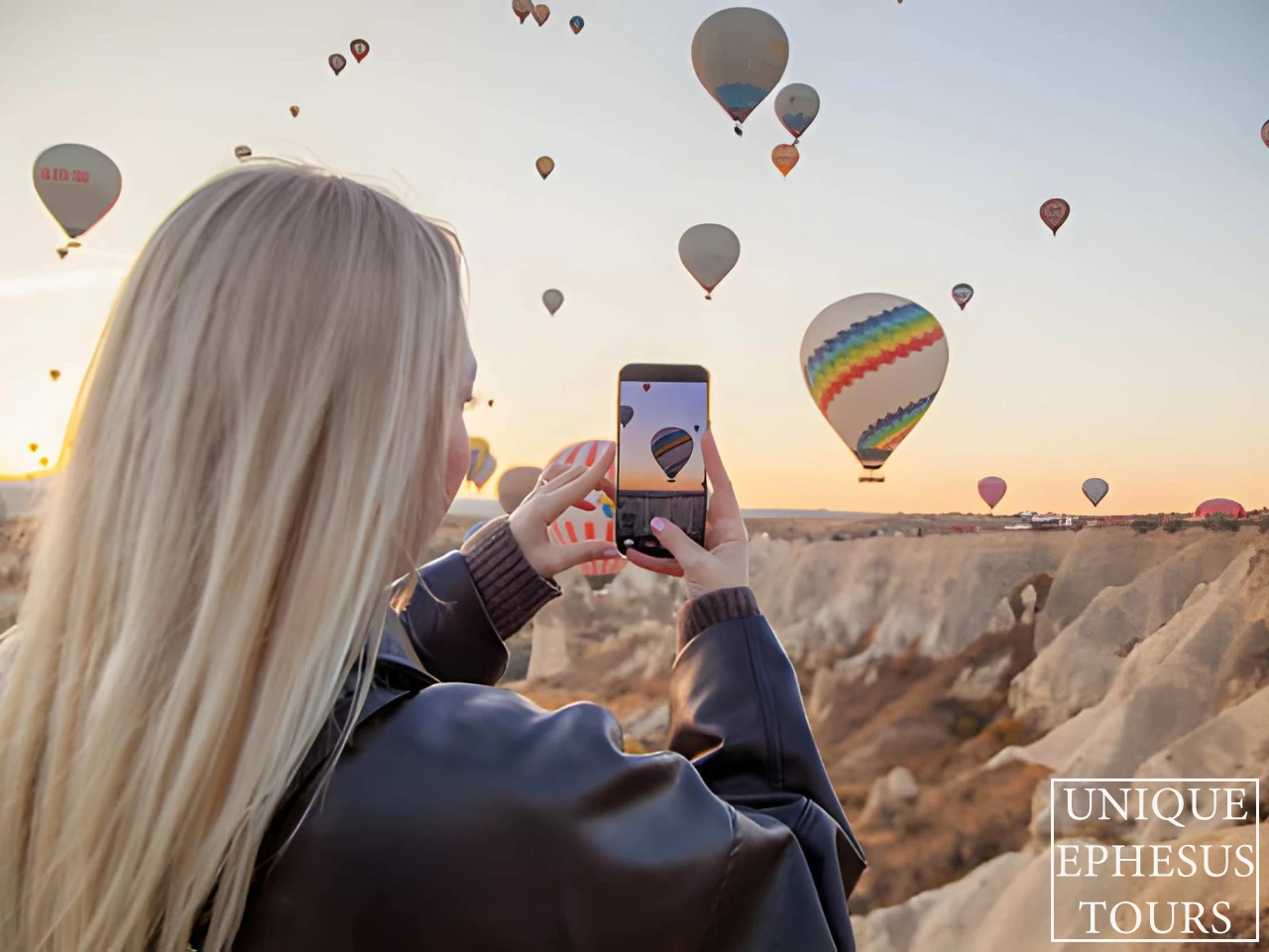 Traveler-Capturing-Hot-Air-Balloons-Cappadocia-Turkey